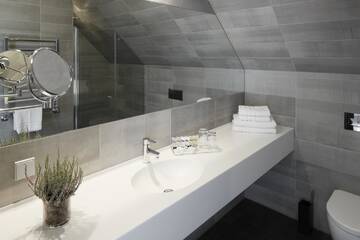 Фото номера Улучшенный номер с кроватью размера «king-size» Отель Zoltners Hotel г. Тервете 6