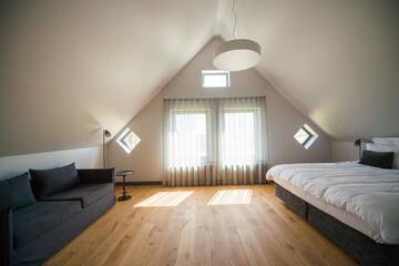 Фото номера Улучшенный номер с кроватью размера «king-size» Отель Zoltners Hotel г. Тервете 4